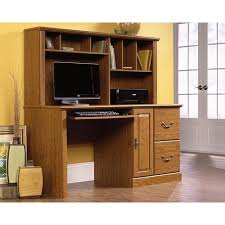 A home computer desk usually has basic features such as a slideout for a keyboard and a bottom section to hold a desktop computer. 401354 In By Sauder In Albany Ny Computer Desk With Hutch