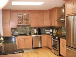 What Granite Looks Best With Red Oak Cabinets Black Granite With Grey Flecks Honey Oak Cabinets Oak Cabinets Light Oak Cabinets
