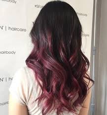 Her naturally auburn shade fades into a bright red sort of hue at the bottom. 10 Best Red And Purple Hair Colour Ideas To Try In 2020