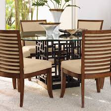 All pieces feature a moderately distressed chestnut brown finish ; Tommy Bahama Home Ocean Club Dining Table Perigold