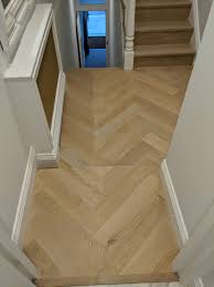 This Chevron Floor Has Been Fitted With A Step Down In The Landing When This Occurs We Always Match Up The Wood Stairs Cladding Wood Parquet Flooring Flooring