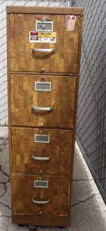 Metal 4 Drawer Filing Cabinet Covered With A Wood Design Contact Paper Each Drawer Has A Separate Loc Filing Cabinet Drawer Filing Cabinet File Cabinet Desk