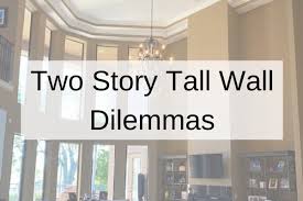 Below are 7 top images from 18 best pictures collection of two story living room decorating ideas photo in high resolution. How To Decorate A Tall 2 Story Wall More Tall Wall Dilemmas Designed