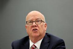 Bob Woodward seeks to end Donald Trump's lawsuit over audiobook