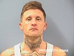 TUTTLE SEAN M 02/14/2022