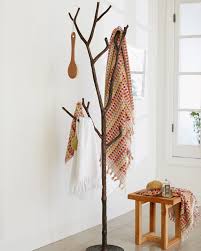 Homebi coat rack hat stand free standing display hall tree metal hat hanger garment storage holder with 9 hooks for clothes hats and scarves in compare with similar items. 15 Cool Coat Racks That Really Branch Out