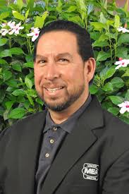 Good friends Megan, Rashaad and Talia enjoy the Harvest Ball
