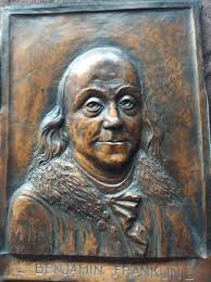 Antique copper Ben Franklin wall decor