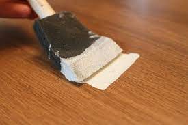 How To Paint Fake Laminate Wood Hunker Painting Laminate Furniture Laminate Furniture Fake Wood
