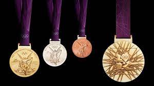 Gold, awarded to the winner; London S Olympics Medals Are The Heaviest Bling Yet Olympic Medals Medal Design London Olympic Games
