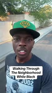 Black Kid Walking in A White Neighbor Hood
