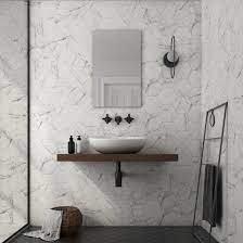 Of course, there are a few things to consider before this scandinavian bathroom keeps things simple and uses the same square tile on both surfaces sure, a marble bathroom this spectacular comes at a cost, but the effect is extraordinary. Hexagon Carrara Marble Effect Wall Floor Tiles Marble Effect Tiles From Tile Mountain