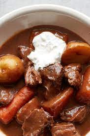 Oven Braised Guinness Beef Stew With Horseradish Cream Recipe Recipe Guinness Beef Stew Beef Stew Stew