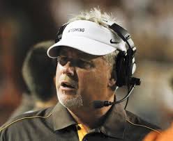 Wyoming football coach Dave Christensen and athletic director Tom Burman  address Mountain West reprimand