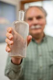 Unearthing Time in a Bottle