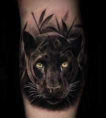 The mask is the continent on this man's shoulder. Panther Tattoos Meanings Tattoo Designs Ideas In 2021 Big Cat Tattoo Black Panther Tattoo Panther Tattoo
