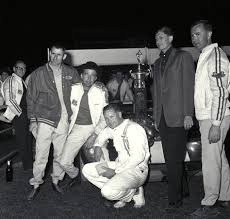 Ken Miles Carroll Shelby Lloyd Ruby Leo Beebe Ray Geddes Celebrate The First Win For The Ford Gt Daytona Continental 200 In 2020 Ken Miles Carroll Shelby Ford Gt