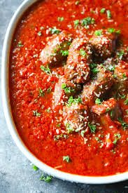 This Italian Sausage Tomato Sauce Is Loaded With Tomatoes And Spices It S Great Over Zuc Italian Sausage Sauce Recipe Italian Tomato Sauce White Sauce Recipes