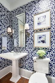 The black and white spotted wallpaper, black and bronze aged gold brass pendants and iron bronze round mirror set the stage for the white furniture style vanity with moen brushed gold faucet in this lovely powder room. 40 Powder Room Ideas To Jazz Up Your Half Bath
