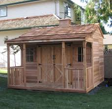 Lofted cabin with premium porch Garden Shed With Covered Porch Backyard Shed Living Space Cedarshed Canada