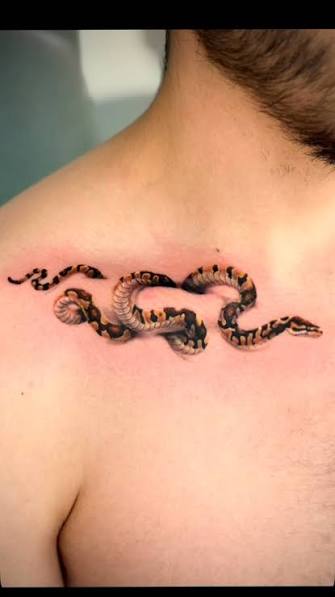 Ball python clavicle tattoo from a bit ago! #ballpython #ballpythontattoo #snake #snaketattoo #clavicletattoo