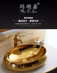 Here some details are given below to make a good decision to choose. Sink Hot Cold Water Mixer Bathroom Sink Washbasin Above Counter Basin European Ceramic Sink Art Basin Gold Wash Basin Oval Bathroom Sinks Aliexpress