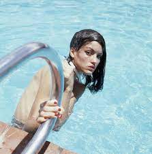Our team is a competitive swim team offering high quality professional coaching and technique instruction for all ages and abilities. Janice Dickinson Holding Railing In Swimming Pool Art Print By Horst P Horst Swimming Pool Photography Pool Photography Swimming Photography