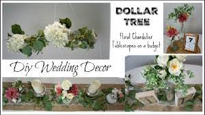With orange roses, purple stock, and two colors of larkspur, these vibrant colors dance in an arrangement that brings a smile to all who see it! Dollar Tree Diy Wedding Decor Floral Chandelier Centerpieces Momma From Scratch Youtube