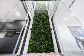 The fence is a willow wood, and the artificial green vines on the top are artificially tied. Artificial Hedges For Outdoors And Their Benefits