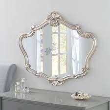 Using a decorative wall mirror or decorative bathroom mirrors helps create the look you desire shopping online for decorative bathroom mirrors gives you an array of options in terms of size. Decorative Silver Overmantle Wall Mirror 91 X 71 Cm Exclusive Mirrors
