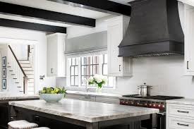 Shop through a wide selection of range hoods at amazon.com. Dark Brown French Range Hood With White Subway Tiles Transitional Bathroom