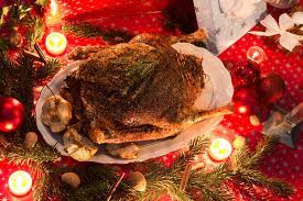 Family decorating eve and fireplace, packing presents, cooking xmas dinner. Christmas Food Traditions Around The World Traditional Christmas Dinner