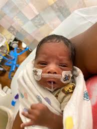 Getting to hold my son for the first time. He was born at 25 weeks, 2  pounds and 2 ounces. I was told by doctors that my son and I would not