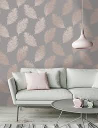 A neutral living room with carved chess by the fireplace and a carved coffee table that hint on moroccan style. 19 Grey And Rose Gold Living Room Ideas Gold Living Room Rose Gold Bedroom Gold Living