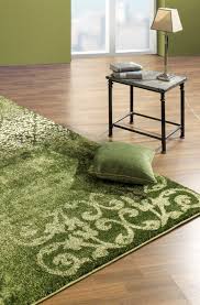 Der teppich ist neu noch original verpackt. Dieser Grune Teppich Beeindruckt Mit Seinem Faszinierenden Muster In Einem Einzigartiges Farbenspiel Und Ma Green Rug Living Room Rugs In Living Room Green Rug