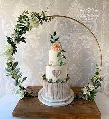 Just Love Our Floral Hoop Stand It Makes Such A Gorgeous Frame For A Wedding Cake We Are Now Making Th Floral Hoops Tall Wedding Cakes Wedding Cake Stands