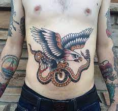 Traditional Eagle And Snake Tattoo On Stomach Stomach Tattoos Tribal Sleeve Tattoos Tattoos