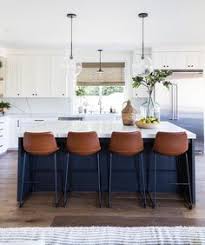 Brown Leather Counter Chairs In Kitchen With Navy Kitchen Island Via Puresaltinteriors Brown Leather Counter Cha In 2020 Home Kitchens Kitchen Design Kitchen Remodel