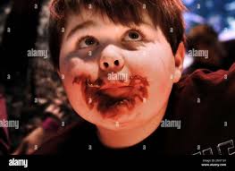 Gavin David , 6 yrs. old of Port Vue, looks up after competing in the "  "pi"-eating contest" at the 12th Annual MessFest2018 held at the Carnegie  Science Center, Monday January 1,