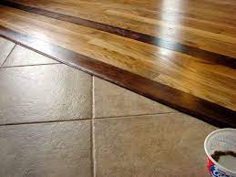 Removed carpet to install tile. Threshold Wood Floor Design Tile To Wood Transition Flooring