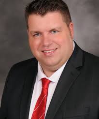 Kyle Broom, 58073-90, Owner