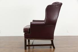 Maybe you would like to learn more about one of these? Leather Vintage Wing Chair Brass Nail Heads Woodmark Originals 36391 Harp Gallery Antiques Furniture