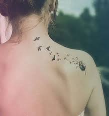Flying Bird Tattoo On Ribs 35 Breathtaking Dandelion Tattoo Designs Dandelion Tattoo Design Tattoos Dandelion Tattoo