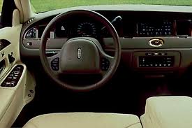Image result for Medium Gold 1998 Town Car