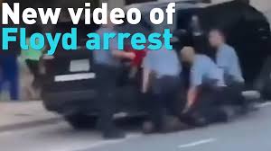 The angle of the video, which is circulating on social media, has not been seen previously. New Video Appears To Show George Floyd Pinned Down By Three Officers Cgtn