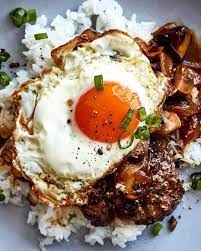 Nyt Cooking On Instagram Loco Moco Is A Hawaiian Classic A Savory Saucy Ground Beef Patty Cooked With Caramelized Oni Loco Moco Hawaiian Dishes Nyt Cooking
