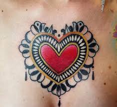 I choose to believe this woman's tattoo is a warning to others that she will vanquish her enemies in the most gruesome manner imaginable, but that's just my interpretation. 95 Best Heart Tattoo Designs Meanings True Love 2019