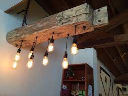 There's no need to call a handyman or pay home depot out the wazoo to come do it for you. Rustic Reclaimed Wood Light Fixture Id Lights Barn Beam Lighting Rustic Light Fixtures Wood Light Fixture