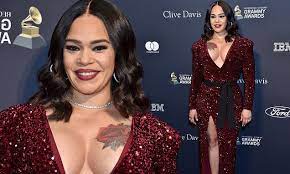 Buckley and abigail ochse with daughter willow and twins bodhi and ranger kate haus photography. Faith Evans 46 Shows Off Her Huge Rose Tattoo In Plunging Red Glitter Gown Daily Mail Online