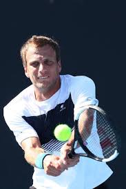 Tennis stats & tennis prediction betting competition & betting tips live score bet for fun. Day 1 Mirza Basic Of Bosnia And Herzegovina Plays A Backhand In His First Round Match Against Henri Laaksonen Of Swit Australian Open Australian Tennis Racket